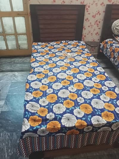 2 single beds with medicated mattress (negotiable)