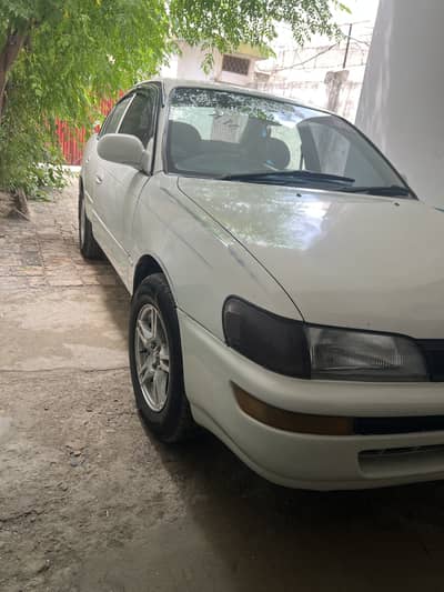 Xe Corolla 1996 white color manual transmission