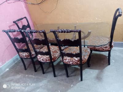 Glass top dinning TAble with 8 chairs