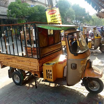 loader rickshaw yellow