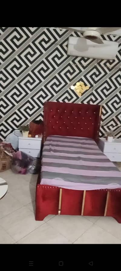 wooden single bed
