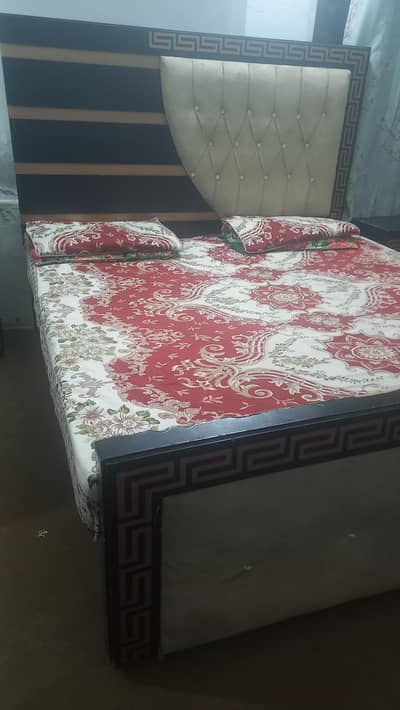 King size bed with 2 side tables,1 dressing and showcase