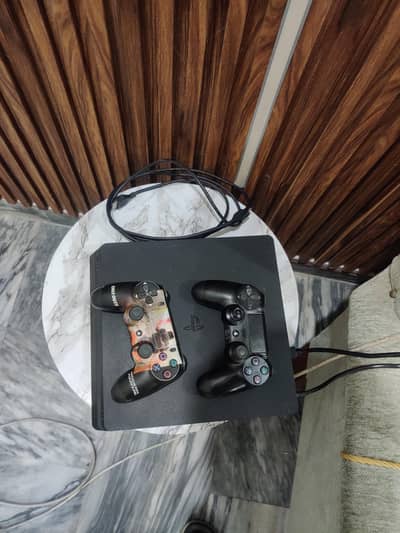 PS4 Slim 500 GB plus EA FC 25