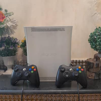 xbox 360 jasper elite with 2 controllers and box 100 games