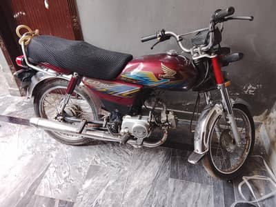 Honda CD 70 red