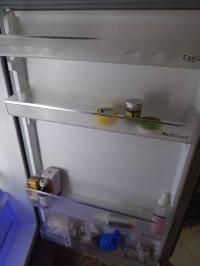 Dawlance fridge for sale all ok no fault large size brown black colour