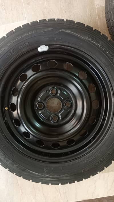 15" Alloy Rims + Tires