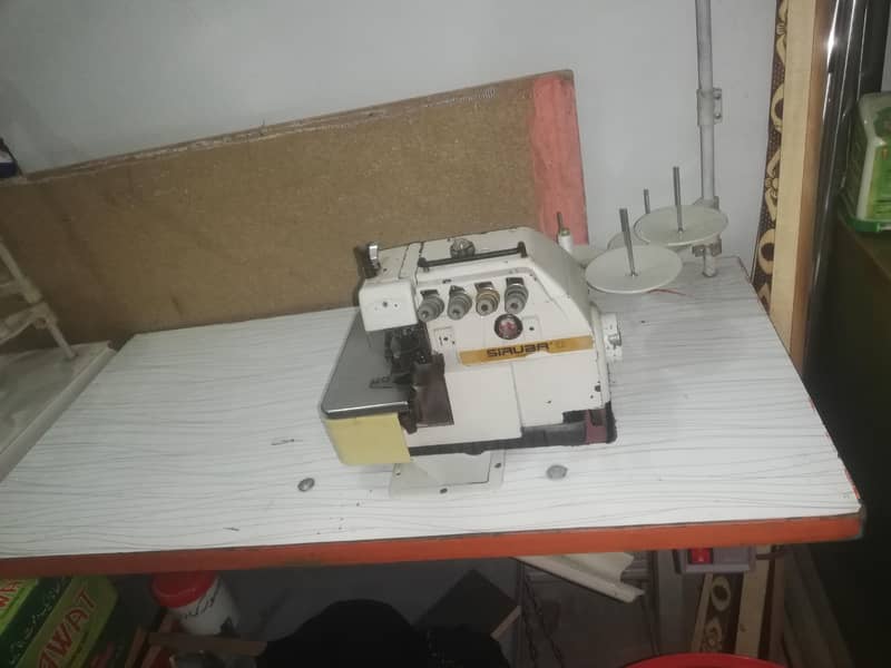 Garment Over Lock Machine & 4 Thread Machine 4