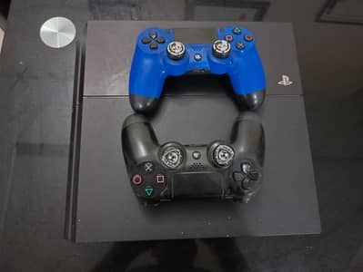 PS4 500GB + 2 Original Controllers + 1 Year Subscription Of Games
