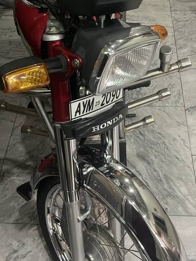 cd70 honda 2023 ka 12 mehy ka bike hy saf sotra hy attock number hy
