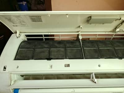 AC . Salon chair. mirror . screen. ficial bed