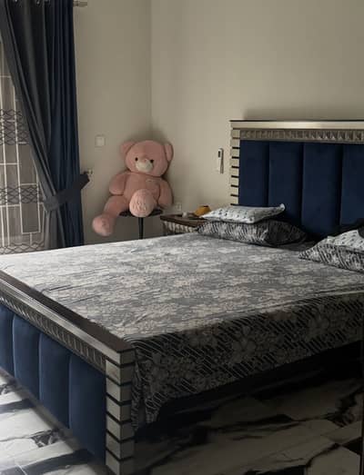 Bed with side tables
