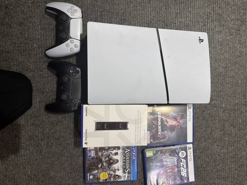 PS5 Bundle with 2 Controllers & 3 Games  0