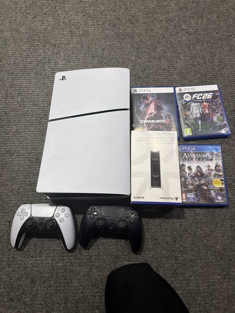 PS5 Bundle with 2 Controllers & 3 Games  1