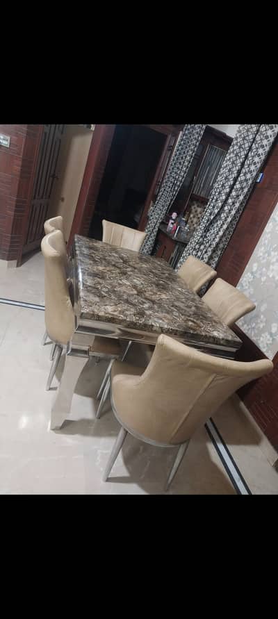 6 seater modern steel dining table with marble top