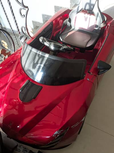 Red Ferrari car suitable for 2-5 years