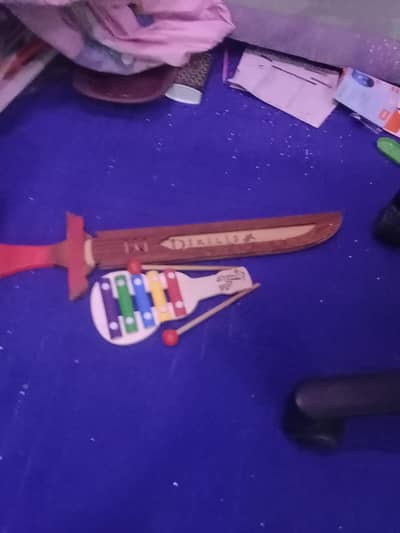 mini piano and sword just in 500