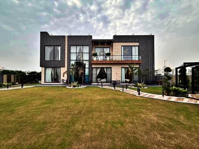 SYED BROTHERS PROUDLY OFFERS: 2-Kanal (1 K. Lawn and 1 K. Bungalow) Elegant And Fully Furnished Modern House with Basement, Swimming Pool, Theater Is Available In The Best Block Of DHA Lahore.