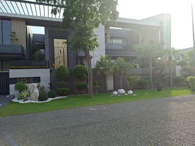 SYED BROTHERS PROUDLY OFFERS: 2-Kanal Elegant And Fully Furnished Modern Bungalow With Swimming Pool Is Available In The Best Block Of DHA Lahore.
