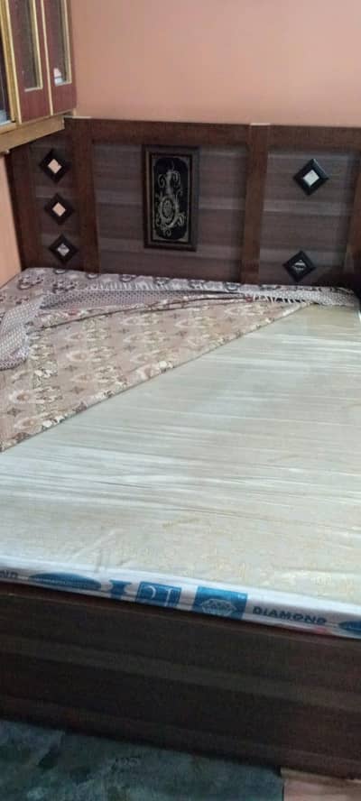 6 By 5 Size Bed with Mattress. Condition is Ok. Contact 03110115416