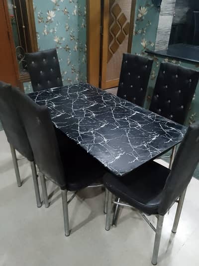Glass top & SS frame dining table for sale