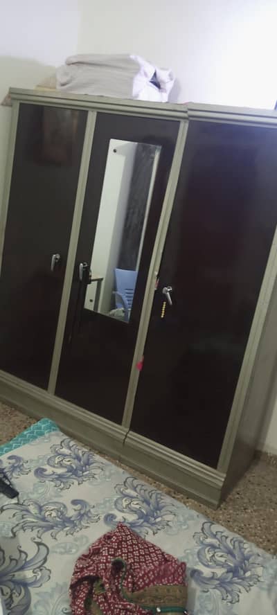 3 door Rod iron wardrobe,,and 2 door wooden wardrobe for selling