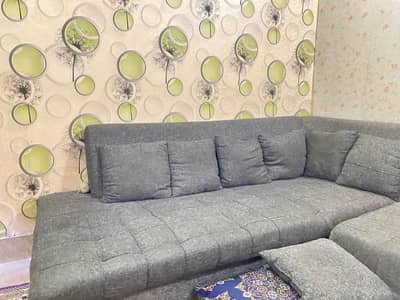 Grey charcoal L shaped sofas