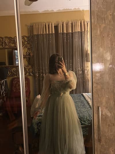 A sage green dress