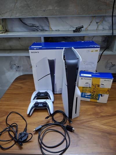playstation with two orignal controllers