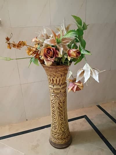 long vase with flowers