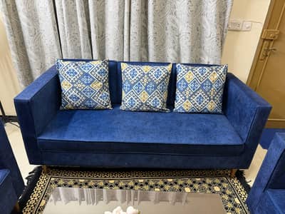 selling 7 seater sofa condition used 1 year  with center table