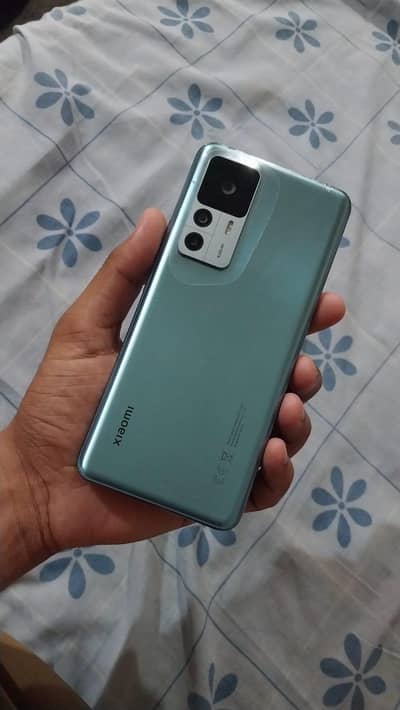 All ok mobile he  10/10 condition Sirf charger with cable.