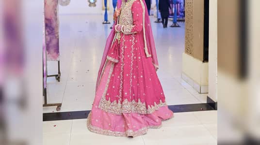 Custom Hand made heavily embroidered double layered bridal dress.