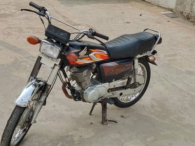 Honda model 2022 condition new engine okay trye new first owner
