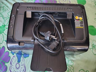 HP printer Leaser jet P1102W with a Cartridge and Power cable