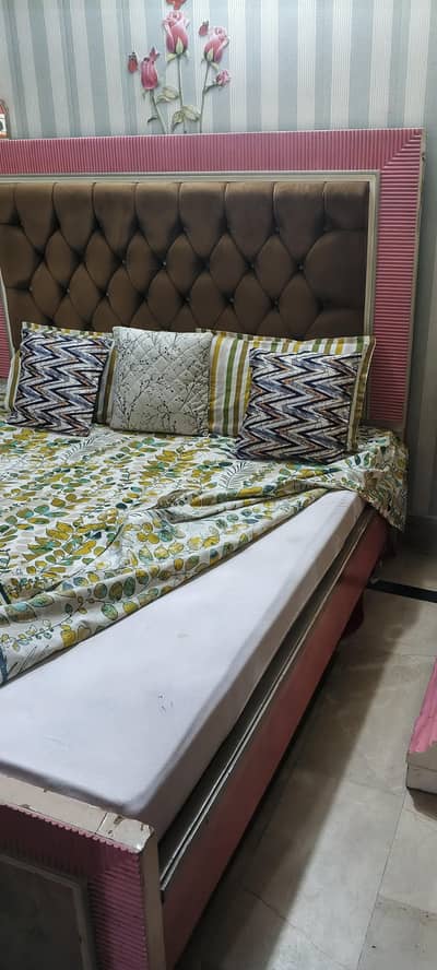 Double bed with side table and dressing