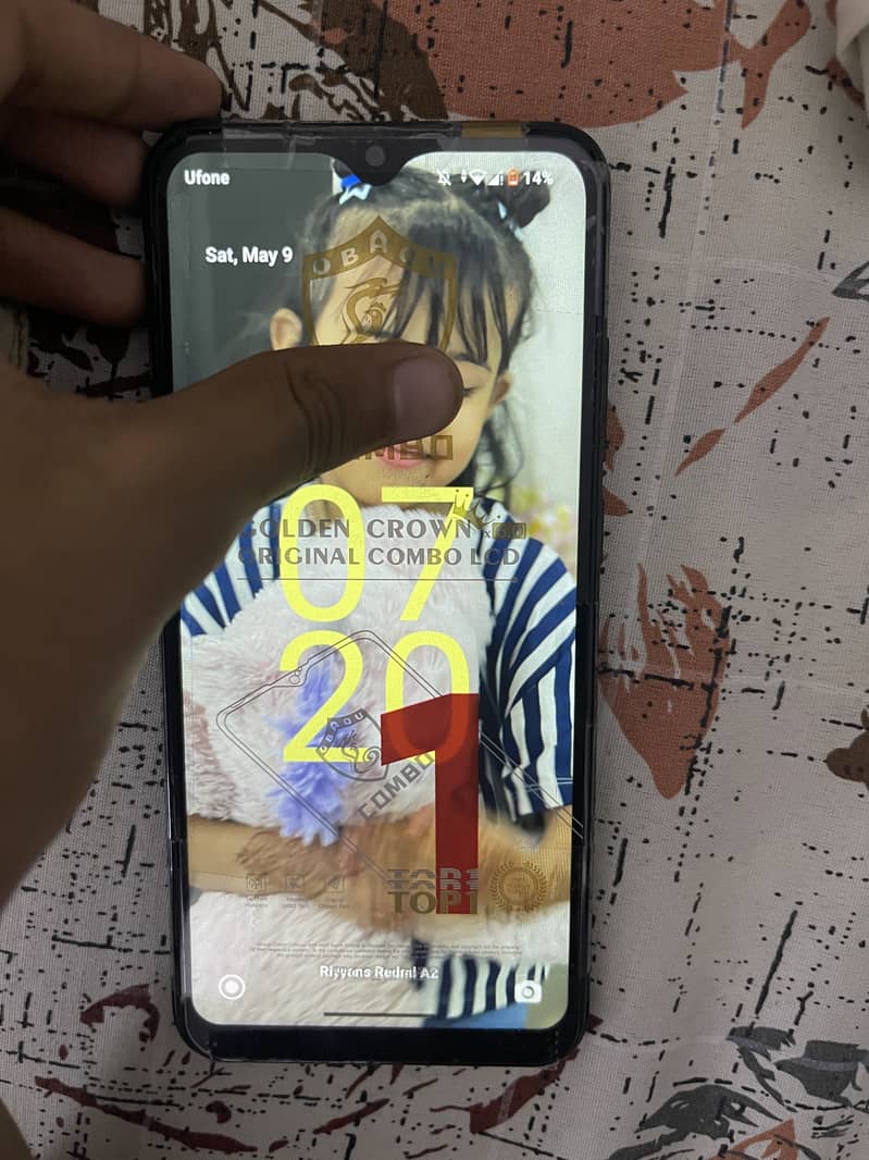 REDMI A2 plus 1
