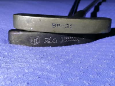 Golf putter and balls