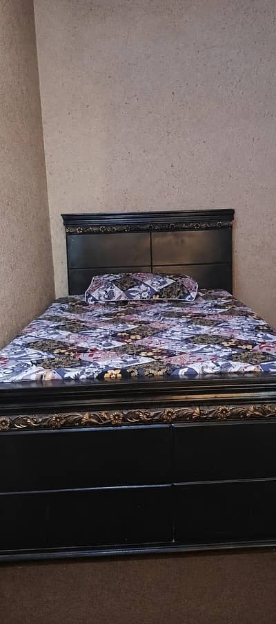 2 single beds and 2 side tables with 2 mattresses