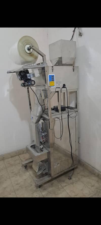 Automatic weighing, Filling & Packing machine