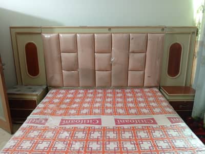 A Used bed in good condition with palai material