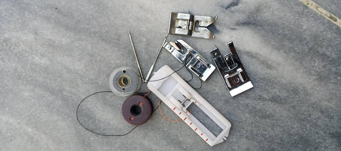 sewing machine  10