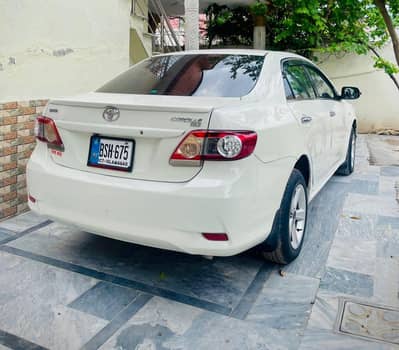 Toyota Corolla GLI 2012 iner total janwan otr 3 pees touch hy