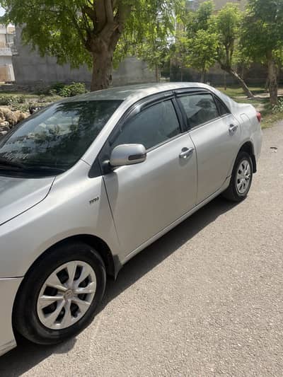 Corolla Xli 2010/11 Silver color engine vip Just Buy and drive