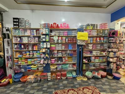 1 dollar shop Rawalpindi Dhok hassu market ma shop ha kam acha ha