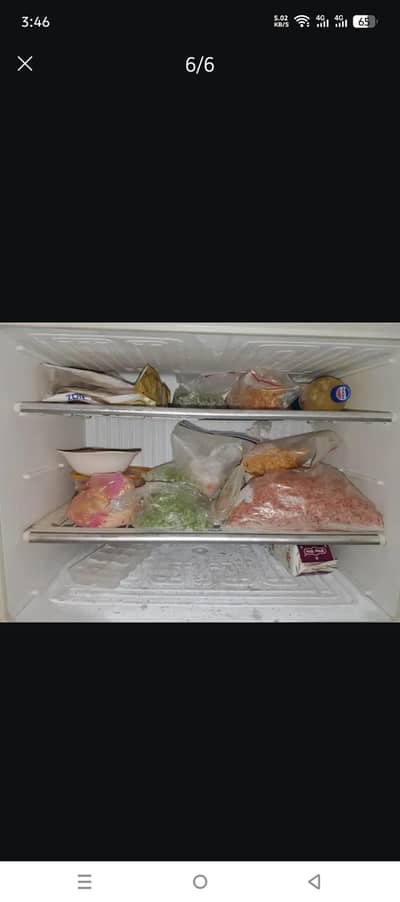 full size fridge is in original condition for sale