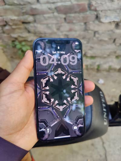 I phone 12 64 Gb Geniune phone no open no repair All ok set.