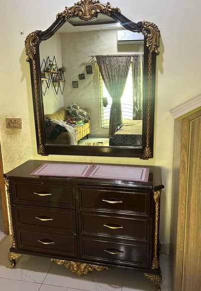 King size bed with  sidetables and dressing table