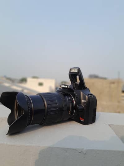 canon 1000d with big auto lense all asseries price finla