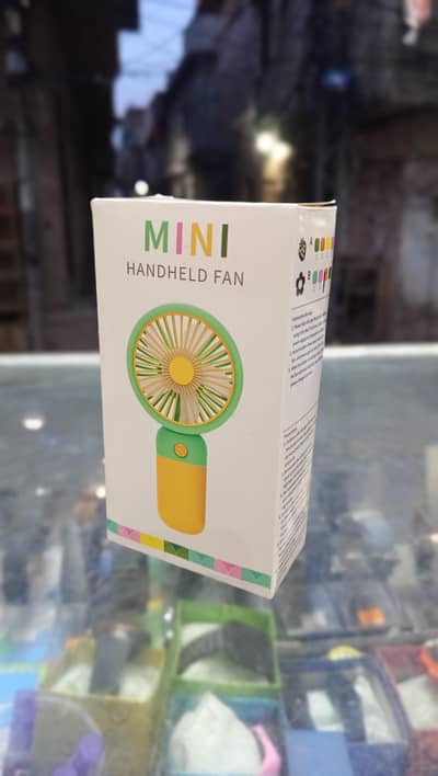 Mini Handheld Fan . Available now. . Good quality